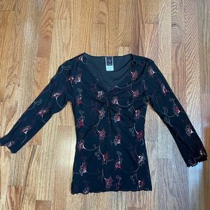 Long sleeved shirt with a v-neck